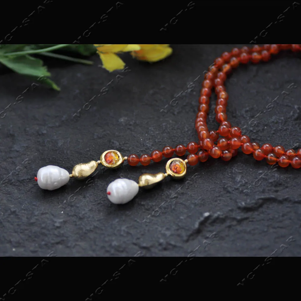 

Ожерелье MTC·STAR 44'' с натуральным красным круглым агатом 22 мм, подвеска в виде золотой тыквы с цветной глазурью и жемчугом (Z14506)