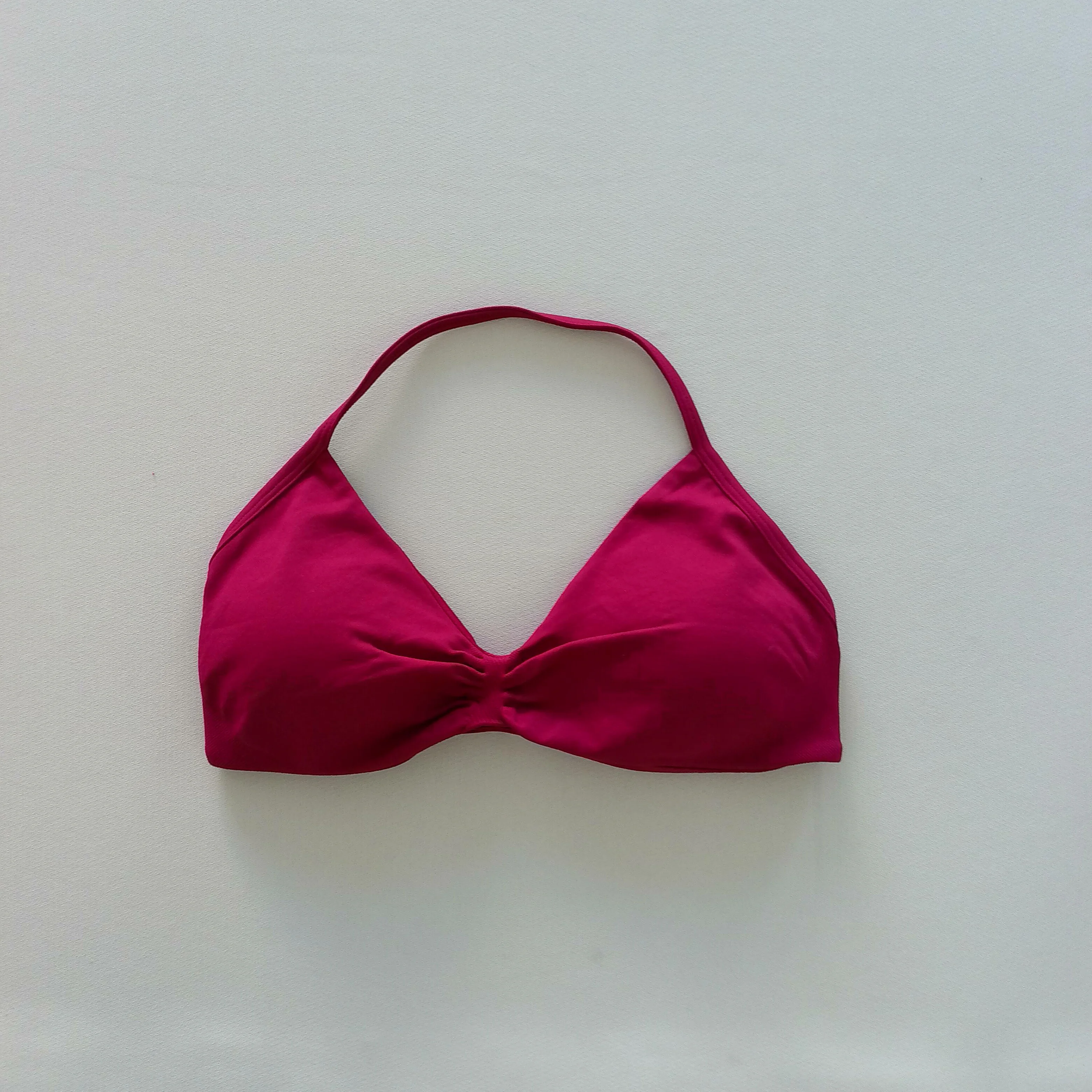 

Slimming neck-wearable strap bra in multiple colors for yoga, Pilates, fitness, and cycling.