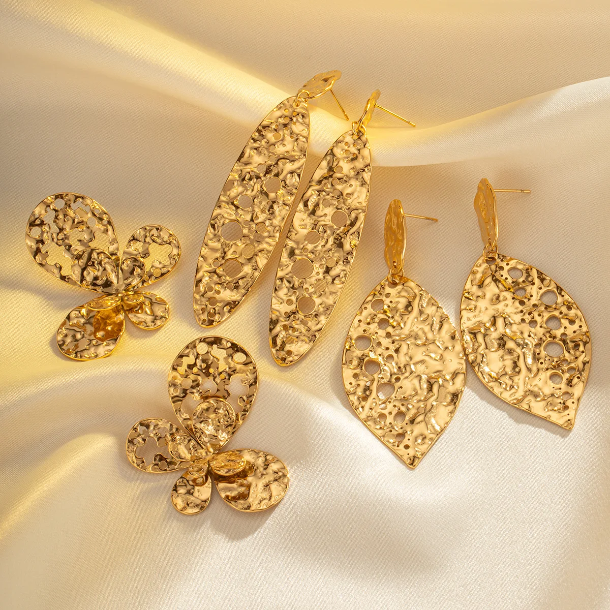 

Fashion Jewelry New Women's High Quality Golden Stainless Steel Hollow Leaf Butterfly Stud Earrings RJ030