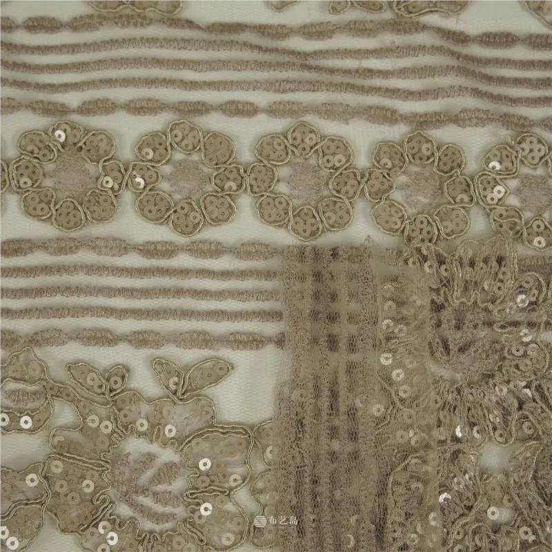 This is a highly embroidered soft and elastic brown-toned mesh sequined fabric dress made of designer