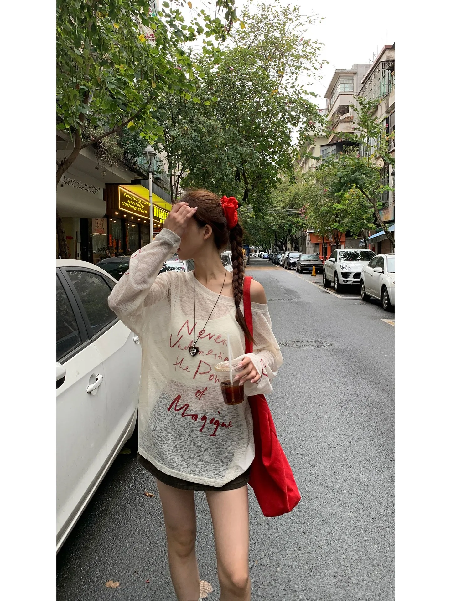 Red Celebri Summer New Loose oulder Long Sve T-shirt da donna Protezione solare Cover up Exposizione unica Faion Top