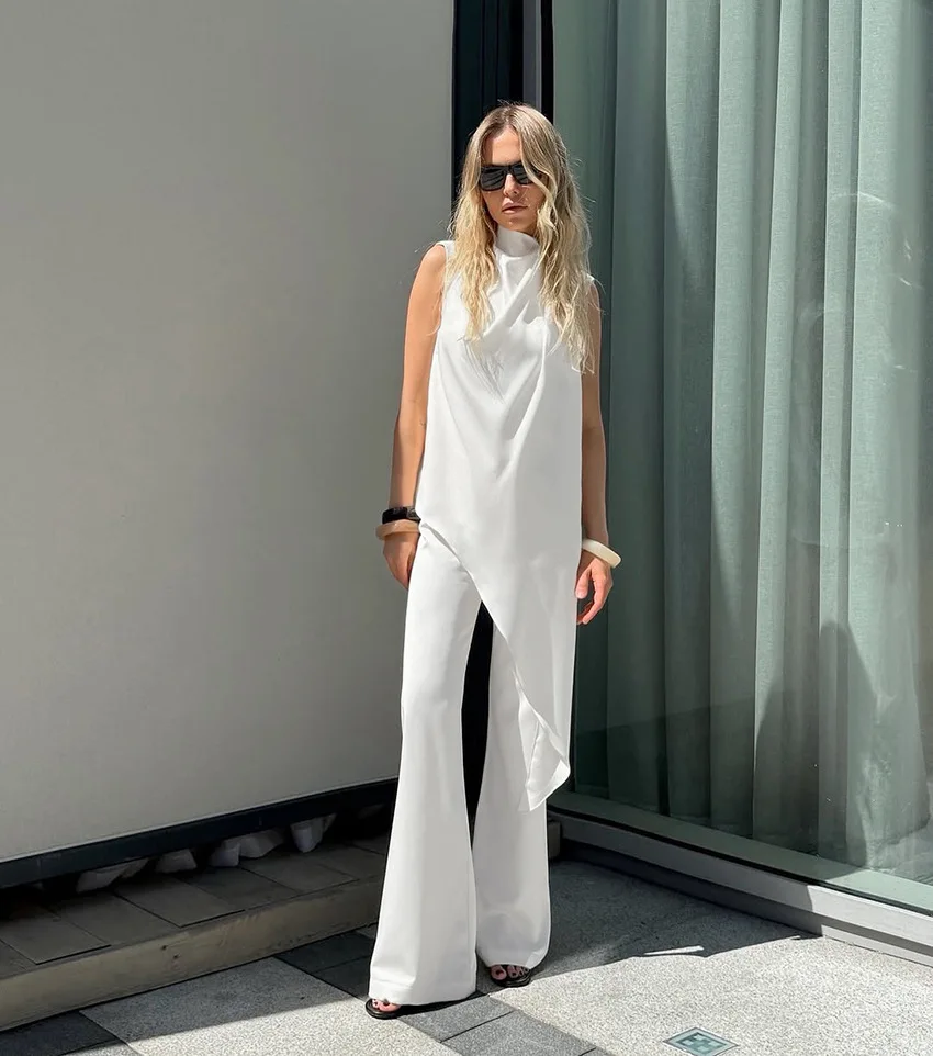 

Весенний белый повседневный брючный костюм для женщин: топ-жилет без рукавов с асимметричным кроем + брюки с высокой талией и широкими штанинами, осенний женский комплект из двух предметов