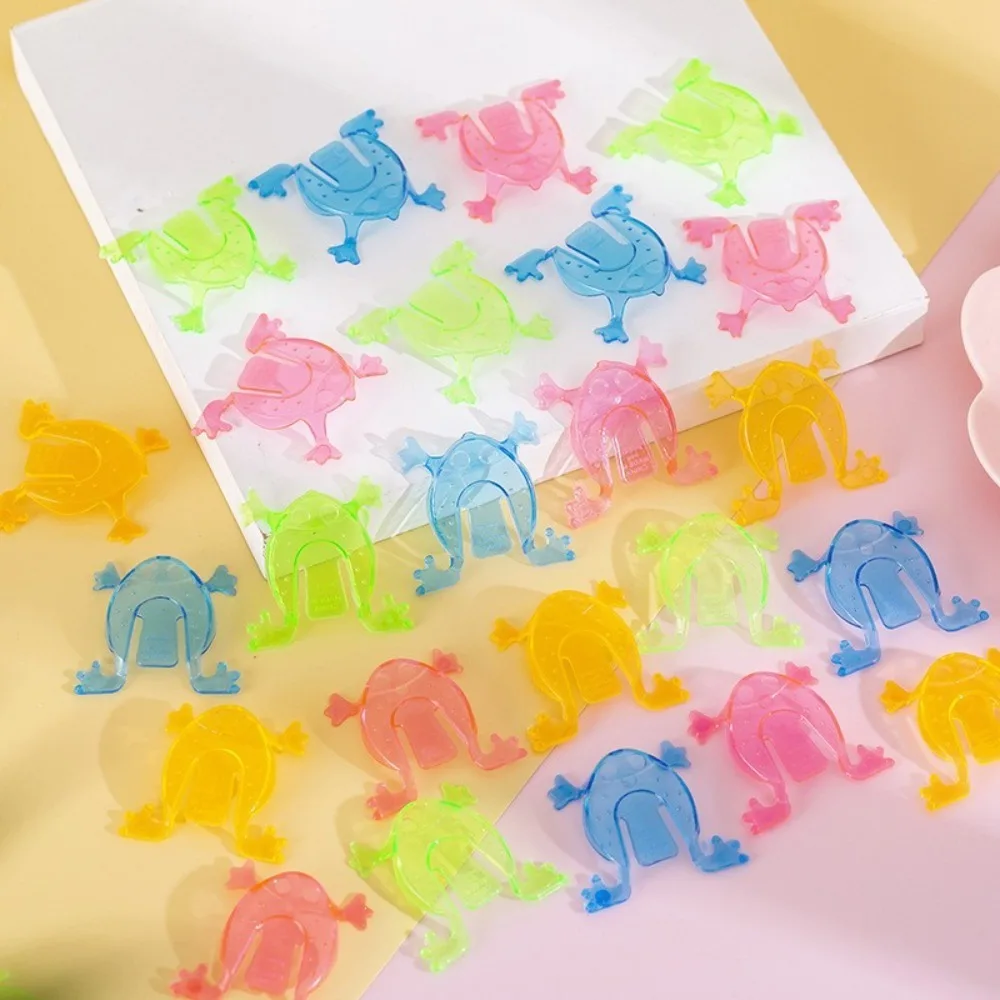 Divertenti giocattoli divertenti in plastica che salta colore casuale trasparente/colore solido giocattoli divertenti che rimbalzano giocattoli rana