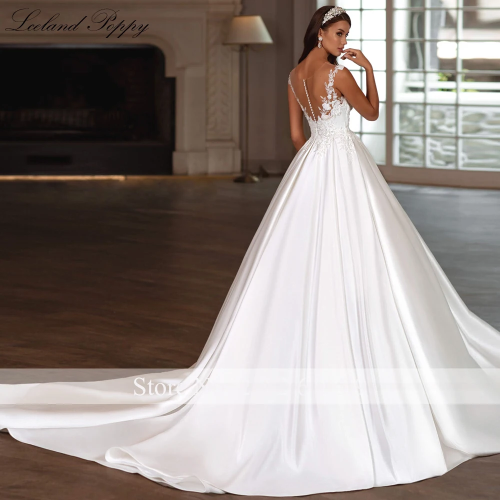 Lceland Poppy Customized A Line Satin Wedding Dresses Cap Sleeves Beaded Bridal Gowns with Court Train