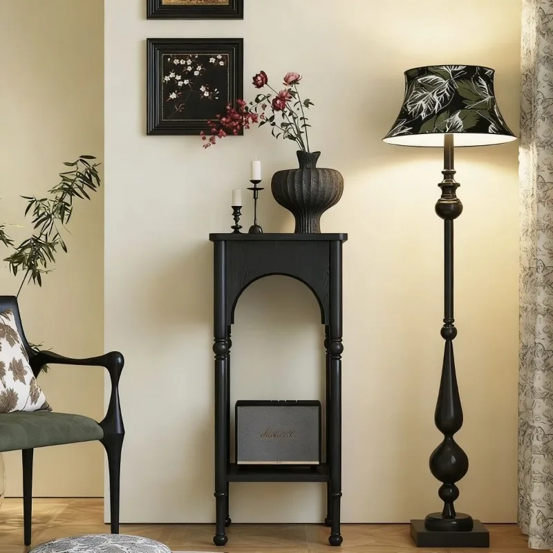 Small retro solid wood entrance cabinet is facing the door and leaning against the wall to the floor storage table entrance