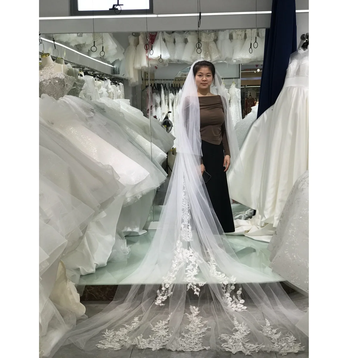 

Kisswhite wear by freedom Length one OR TWO layerS bridal veils each style only one Available Long bridal veils