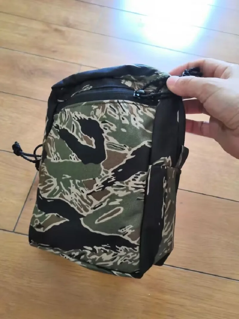 

Многофункциональная сменная панель для сумки/жилета разных вещей