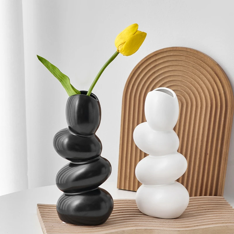 

The product can be customized. The tulip vase is light and luxurious. The bedroom, living room, dining table, porch TV