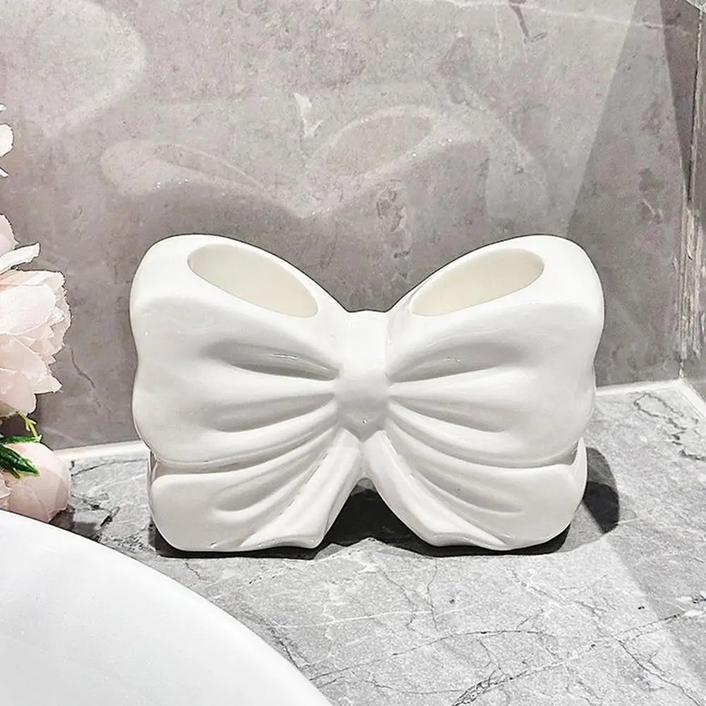 Ceramic Bow Toothbrush Holder - Creative Toothbrush and Toothpaste Storage Rack for Bathroom Organization 1pcs