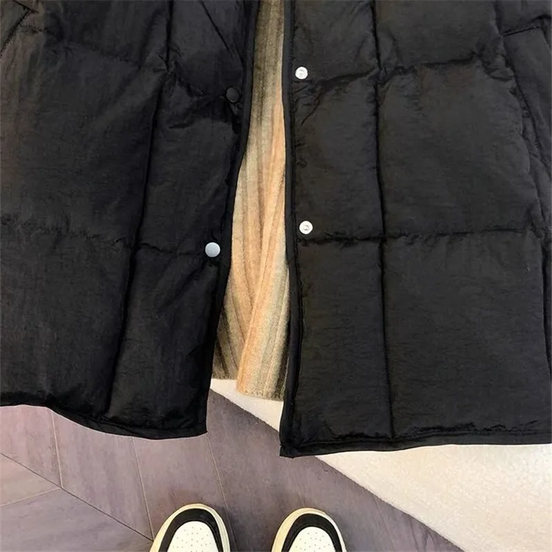 صدرية كلاسيكية للنساء لخريف وشتاء موضة جديدة سترة بأكمام قصيرة ورقبة على شكل حرف v إضافة سترة قطنية ملابس علوية فضفاضة غير رسمية للسيدات