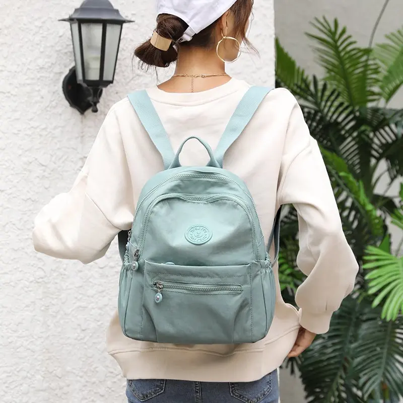 Mochila de gran capacidad para mujer, bolso de viaje ligero y sencillo que combina con todo, bolso escolar de nailon Oxford