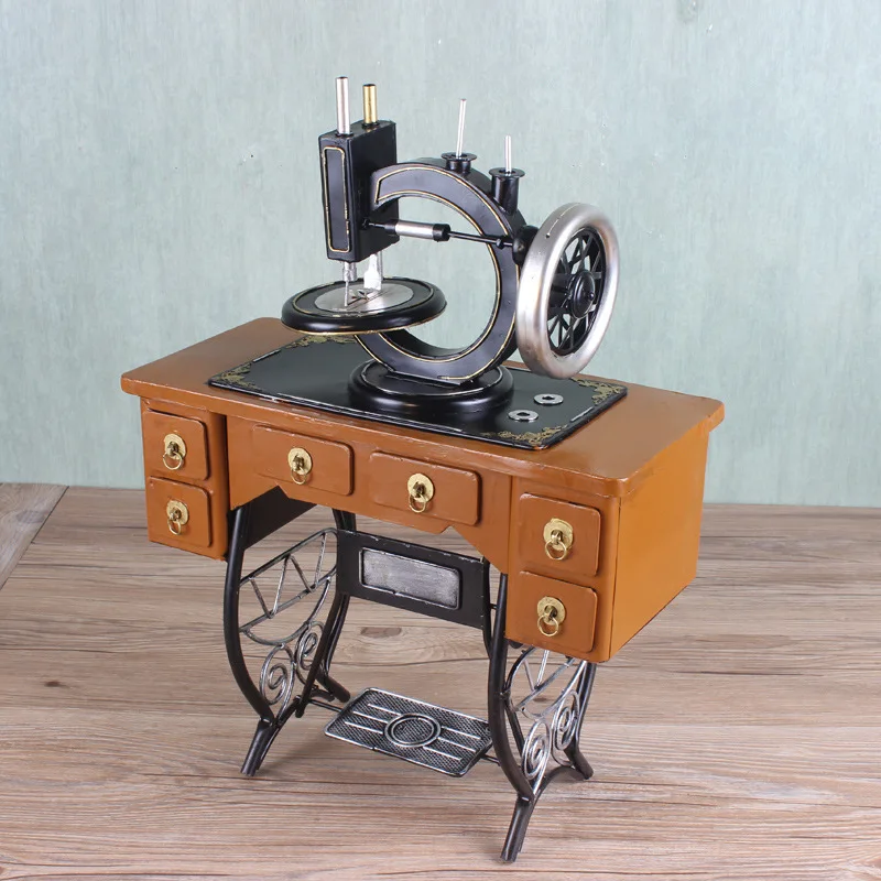Retro nostalgic old-fashioned sewing machine model, clothing store window props, creative ornaments of wrought iron handicrafts