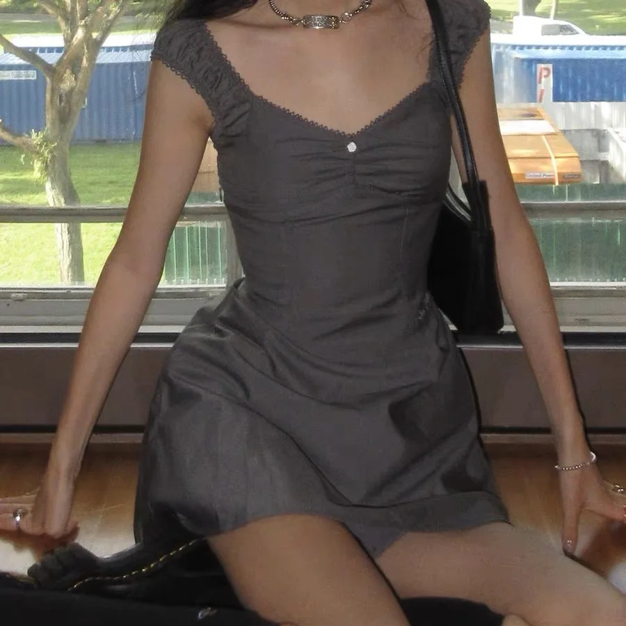 

Летнее утягивающее американское популярное платье трапециевидной формы с кружевным краем и ультракоротким бретелем на одно плечо для девочек