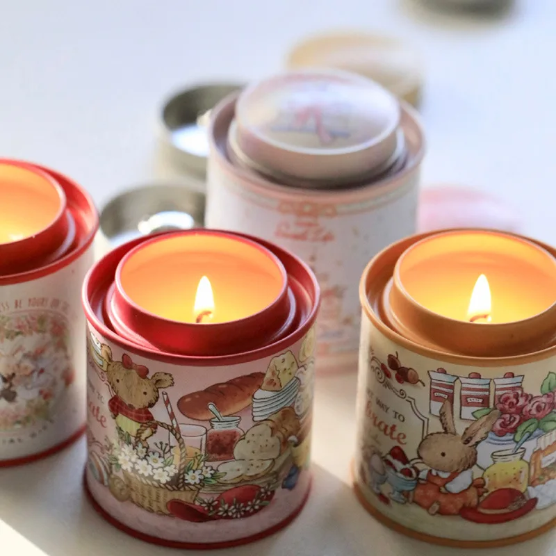 

Scented candles in rabbit tin cans, home fragrance and gift decorations. Tin candlestick holder. Premium in-room fragrance
