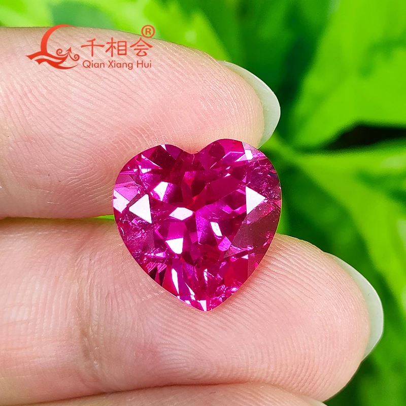 

dark pink color heart shape artificial lab created ruby natural cut including minor cracks and inclusions loose gem stone