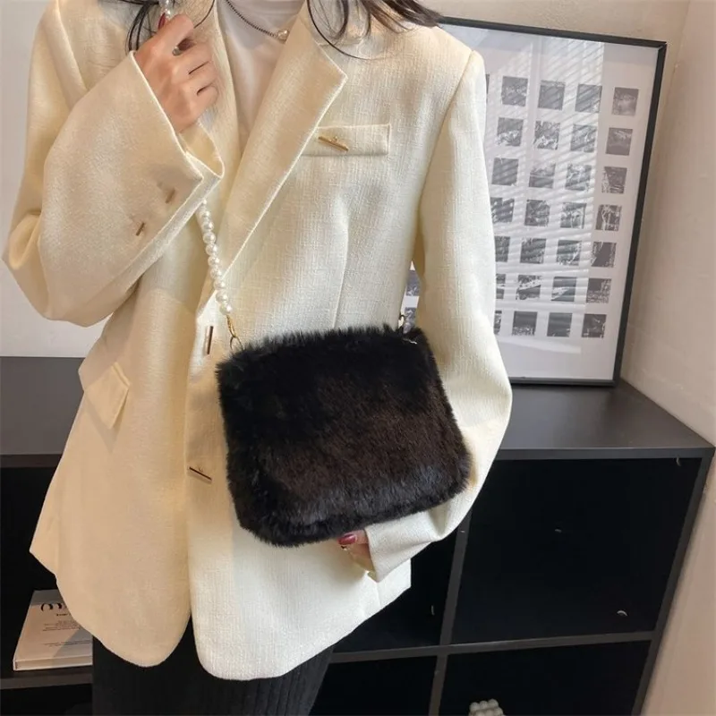 高級トレンディおむつバッグ、ハイエンド無地レザーメッセンジャーバッグ、ユニークな大容量カジュアルショルダーバッグ