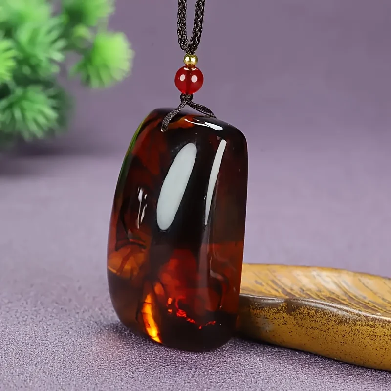 

Amber and white marble design with black rope chain