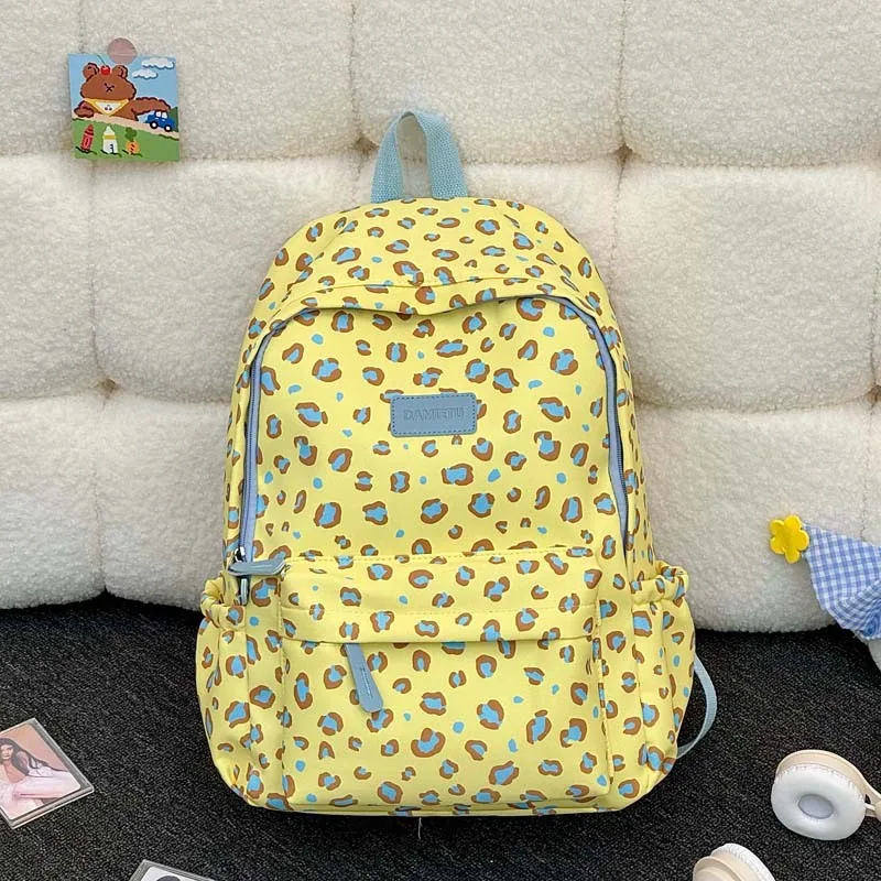 New Milk Pattern Leopard Print Backpack for Women, Large Capacity, Lightweight, Versatile, Student Casual Travel Backpack, Schoo