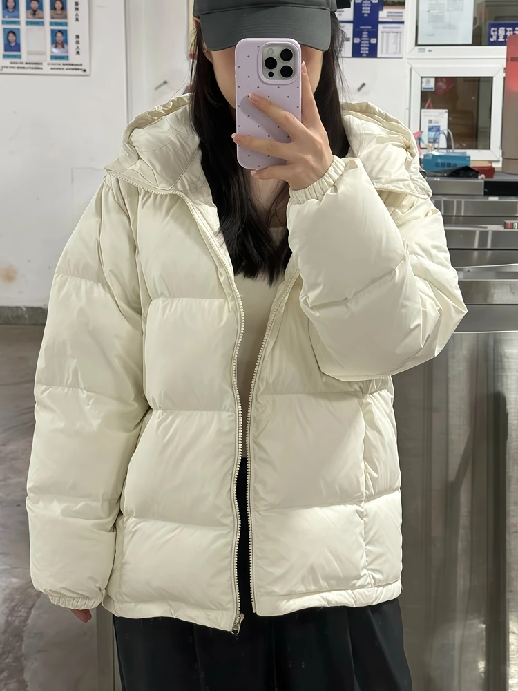 Chaqueta de plumón de color liso para mujer, estilo corto, invierno 2021, nueva chaqueta con capucha para hombre y mujer, chaqueta gruesa de plumón de pato blanco para parejas