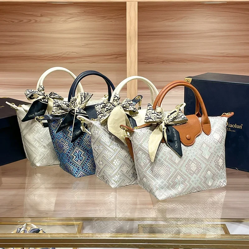 Zhuang Jin women's hand-held crossbody light luxury fashionable women's bag niche high-end dumpling bag