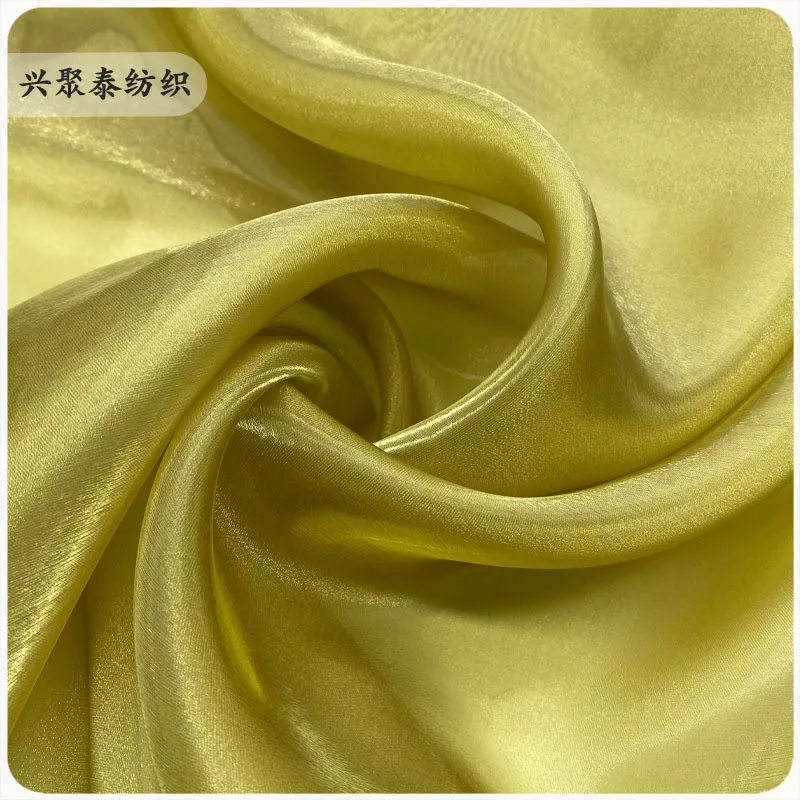 

The fabric for performance dress made of glossy satin is high-density smooth and shiny It a fashion
