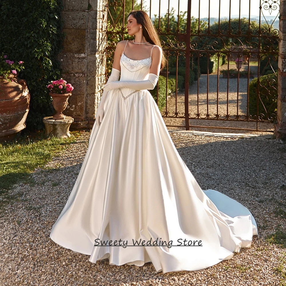 Customized Wedding Dress Sexy Scoop Neck Spaghetti Straples Beading Sequined Court Train A Line Satin Bridal Gown Bride