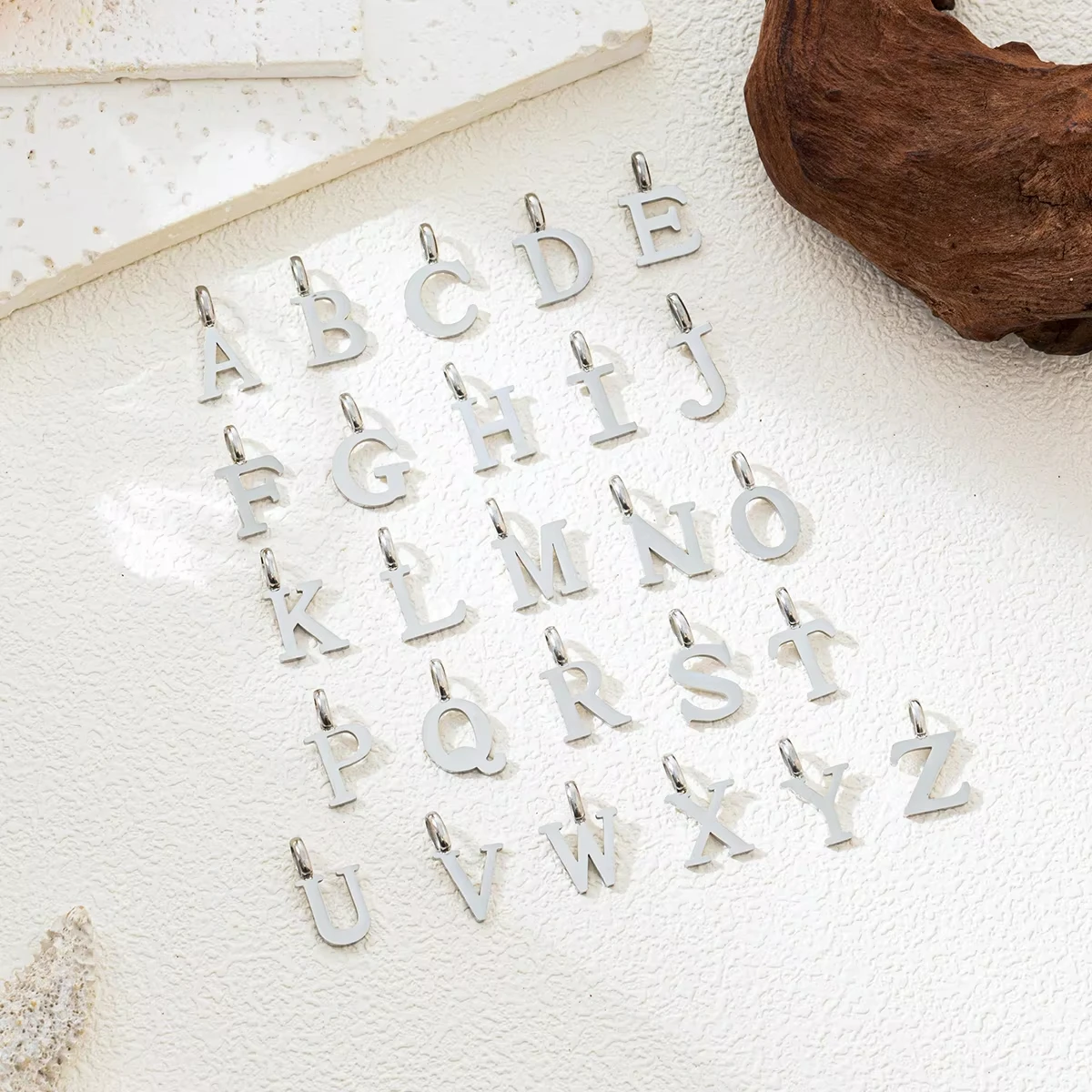 

Hot selling minimalist titanium steel handmade DIY26 steel color English letter pendant for women as a gift