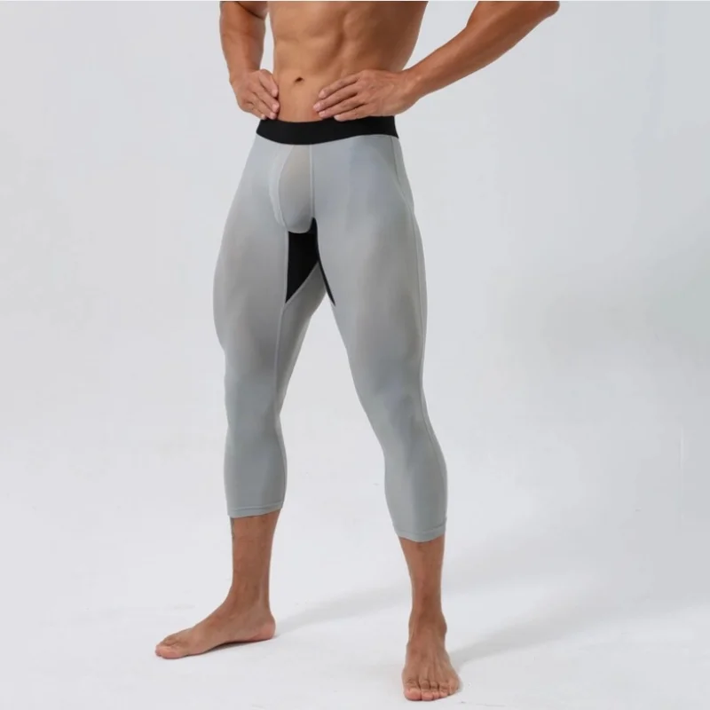 مثير رجل اللياقة البدنية زائد حجم Sweatpants 3/4 السراويل مرونة عالية النمط الأمريكي السراويل سكيت السراويل الرياضية الطويلة