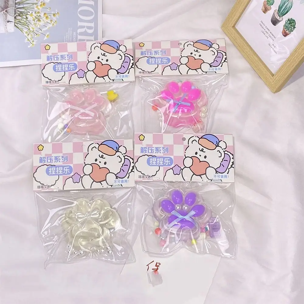 Funny TPR Cat Paw Slow Rebound Toy Transparent Pearl Squeeze Cat Paw Soft Bow Cat Claw Pinch Toy Unique Gift