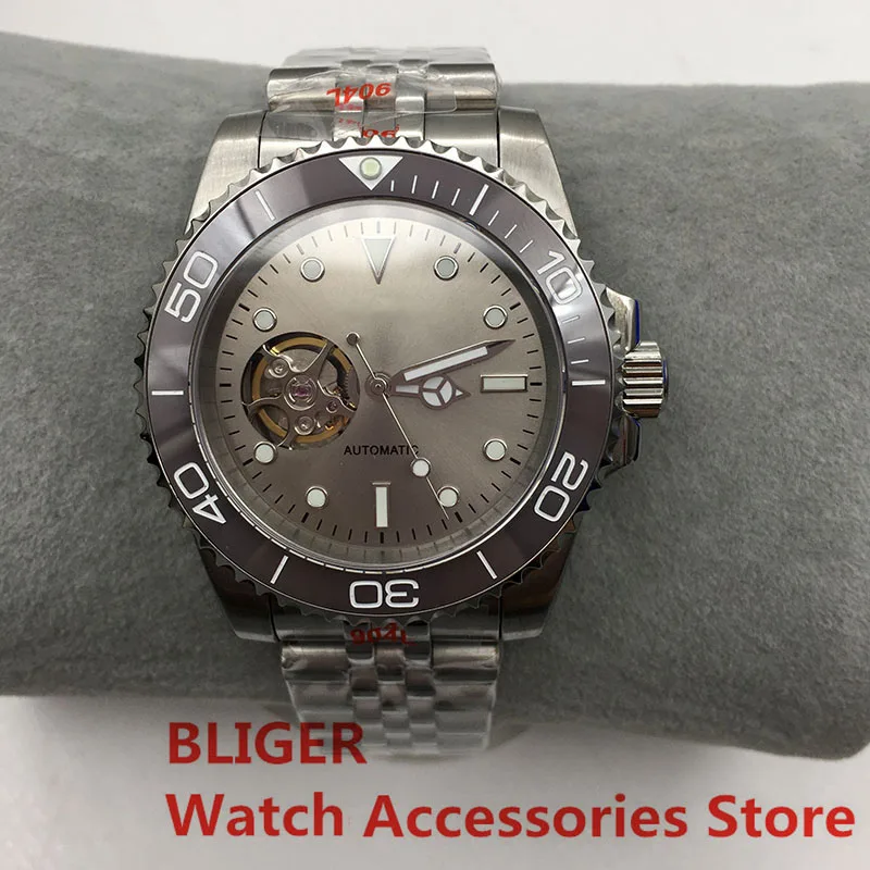 

BLIGER 40mm NH38A Automatic Men‘s Watch Hollow Dial Gray Dial Brown Insert Sapphire Glass Green Luminous Steel Strap