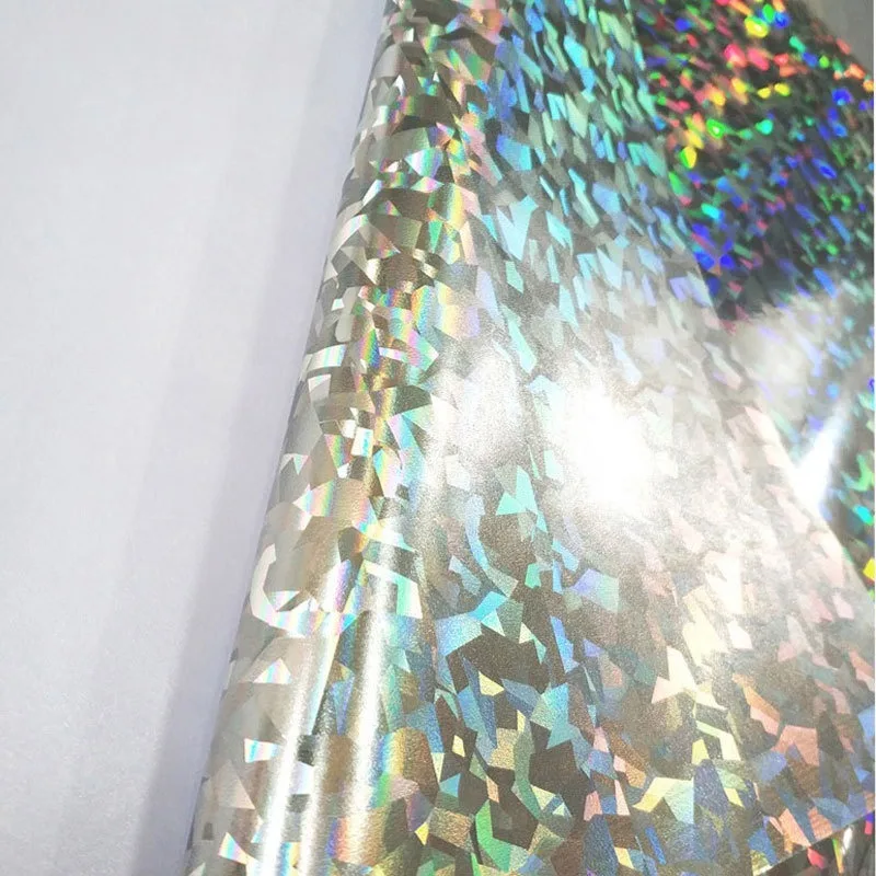 Broken glass can be inkjet painted, and inkjet laser film is provided.