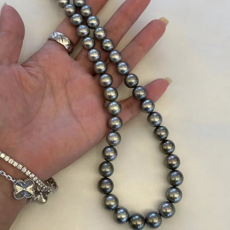 

Натуральный жемчуг платинового черно-серого оттенка, 8-10 мм, круглый, безупречное качество