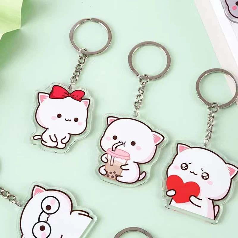 

26pcs/lot Mitao Cat Keychain Cute Animal Couple Peach Cat Schoolbag Ornaments Cat Surrounding Stand Pendant Charm Keyring Gift