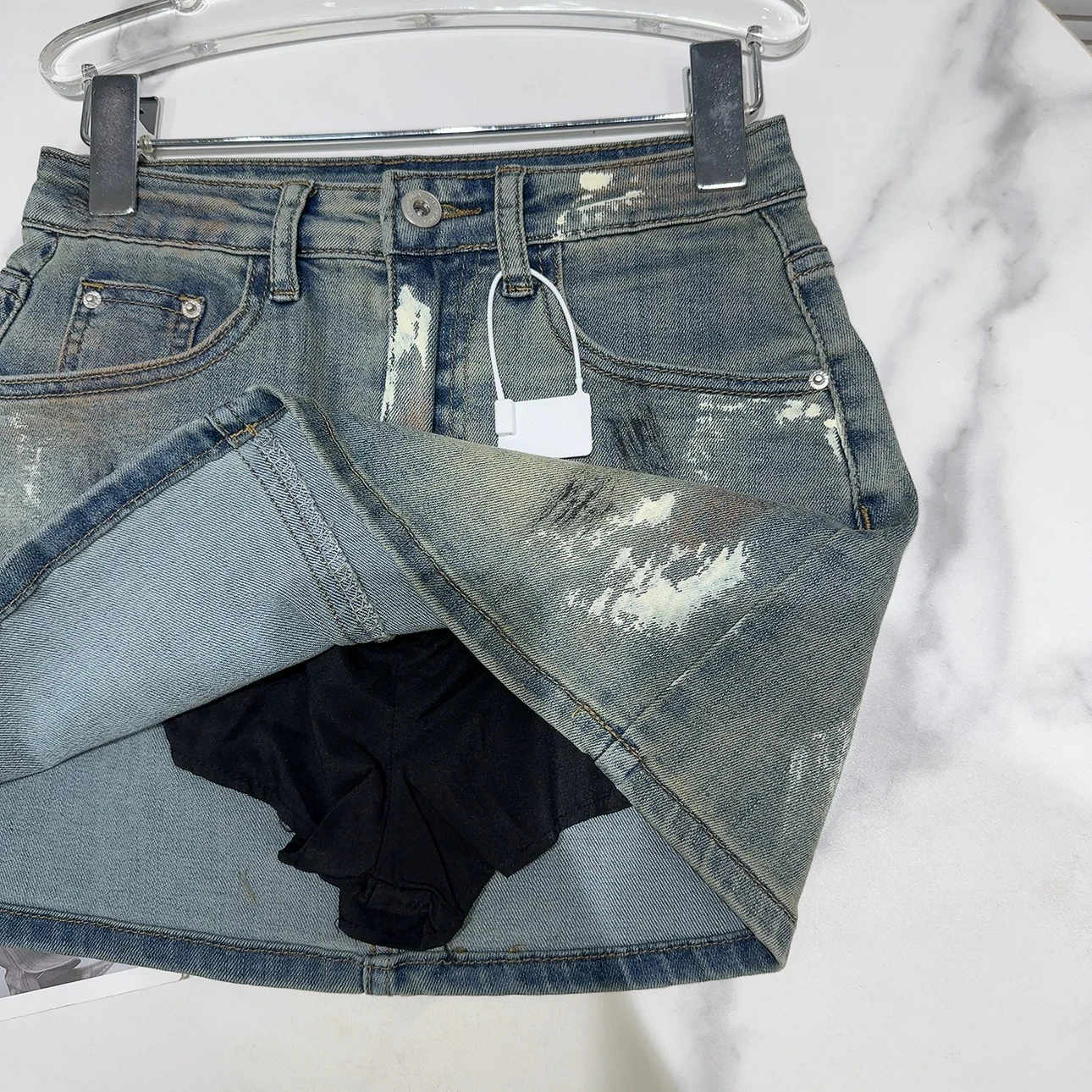 Spódnica dżinsowa Street Sle fiti Waed, modna, zakrywająca pośladki, o długości do kolan, dla młodych kobiet w wieku 20-tych lat.