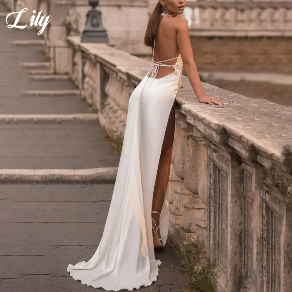 فستان حفلات رسن أبيض من Lily بدون أكمام بدون ظهر للحفلات الراقصة من الساتان الجانبي بفتحة عالية فستان سهرة لحفلات الزفاف حسب الطلب