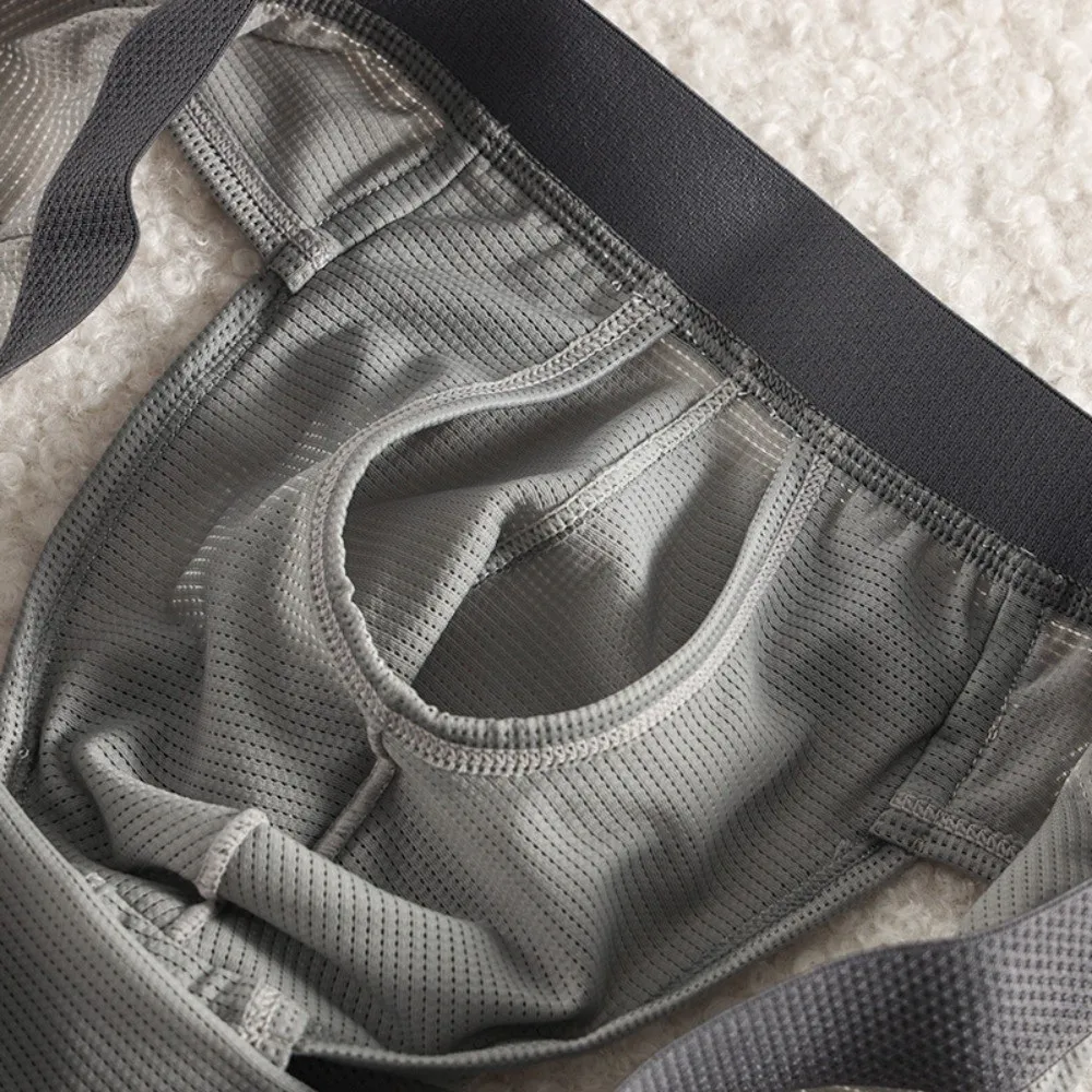 

Thin Underpants Summer Thin Briefs Men Splicing Side Opening Men Ice Silk Panties Lingerie Quick Dry Seamless Underwear Summer