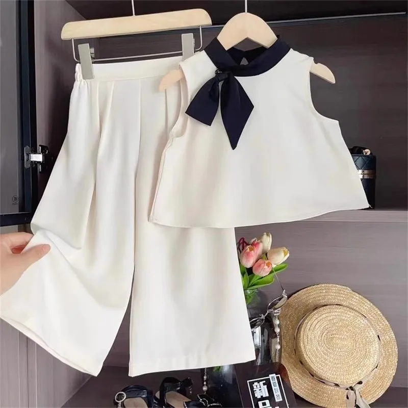 

Girls Summer Chic Set – White Sleeveless Top with Bow & Wide Leg Pants, Elegant Kids Fashion Outfit for Ages 3-8