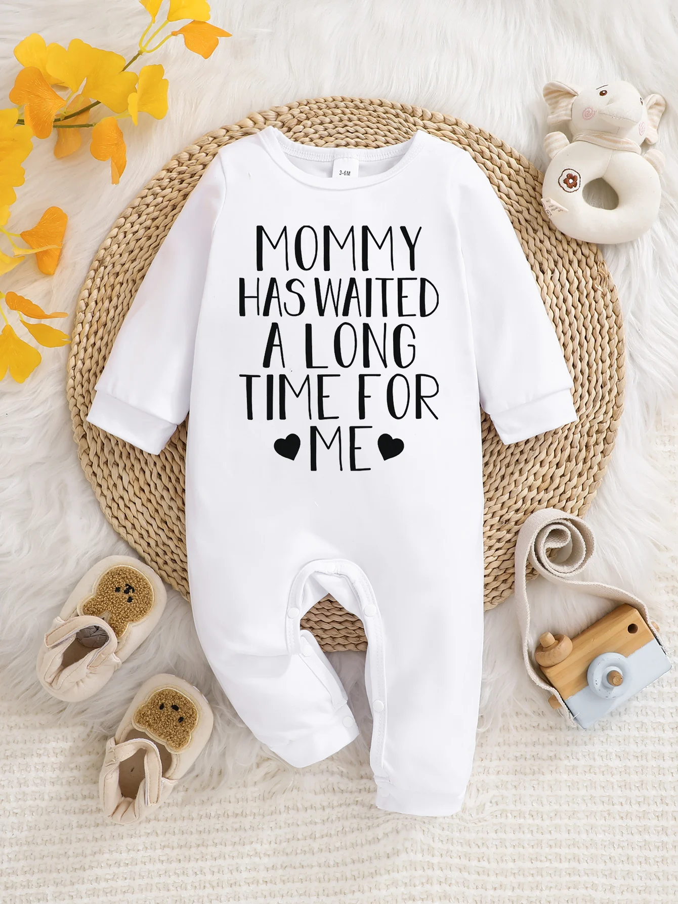 

Детский комбинезон с длинными рукавами, забавным буквенным принтом, на пуговицах, простой в уходе, подходит для молодых родителей.