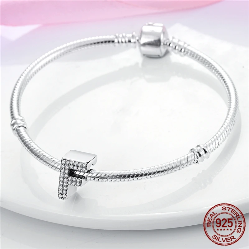 This DIY women's jewelry gift features an S925 sterling silver letter F bead paired with an original bracelet.