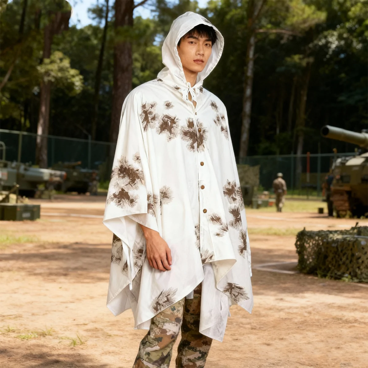 

German-style cape, thick cotton material, white/pine camouflage, imported.