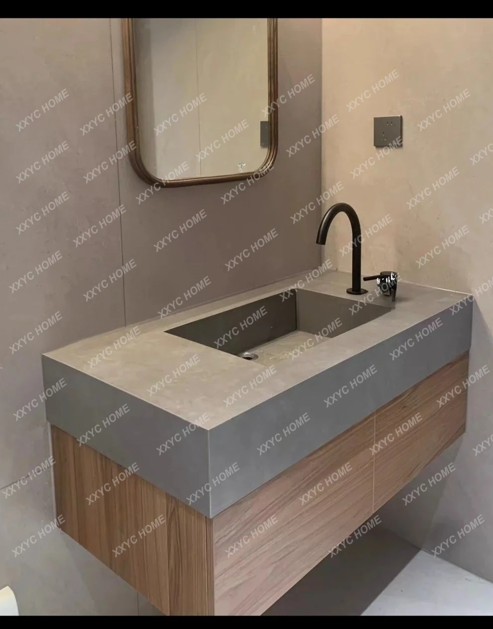 LSimple and modern, custom rock slab integrated basin sink
