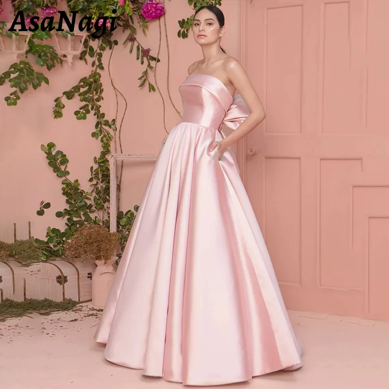 

AsaNagi Sexy Strapless Prom Dress Women's Bow A-Line Party Evening Gowns Satin Floor Length Special Occasion Gown with Pockets