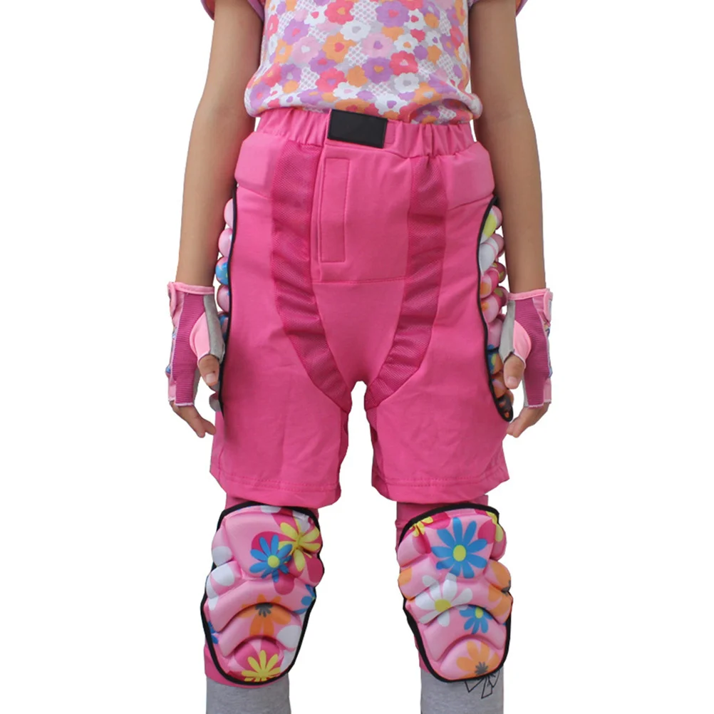 سروال الورك الواقي للأطفال باللون الوردي قصير مع وسادة سميكة لسلامة المؤخرة والمنشعب في لوح التزلج على الجليد