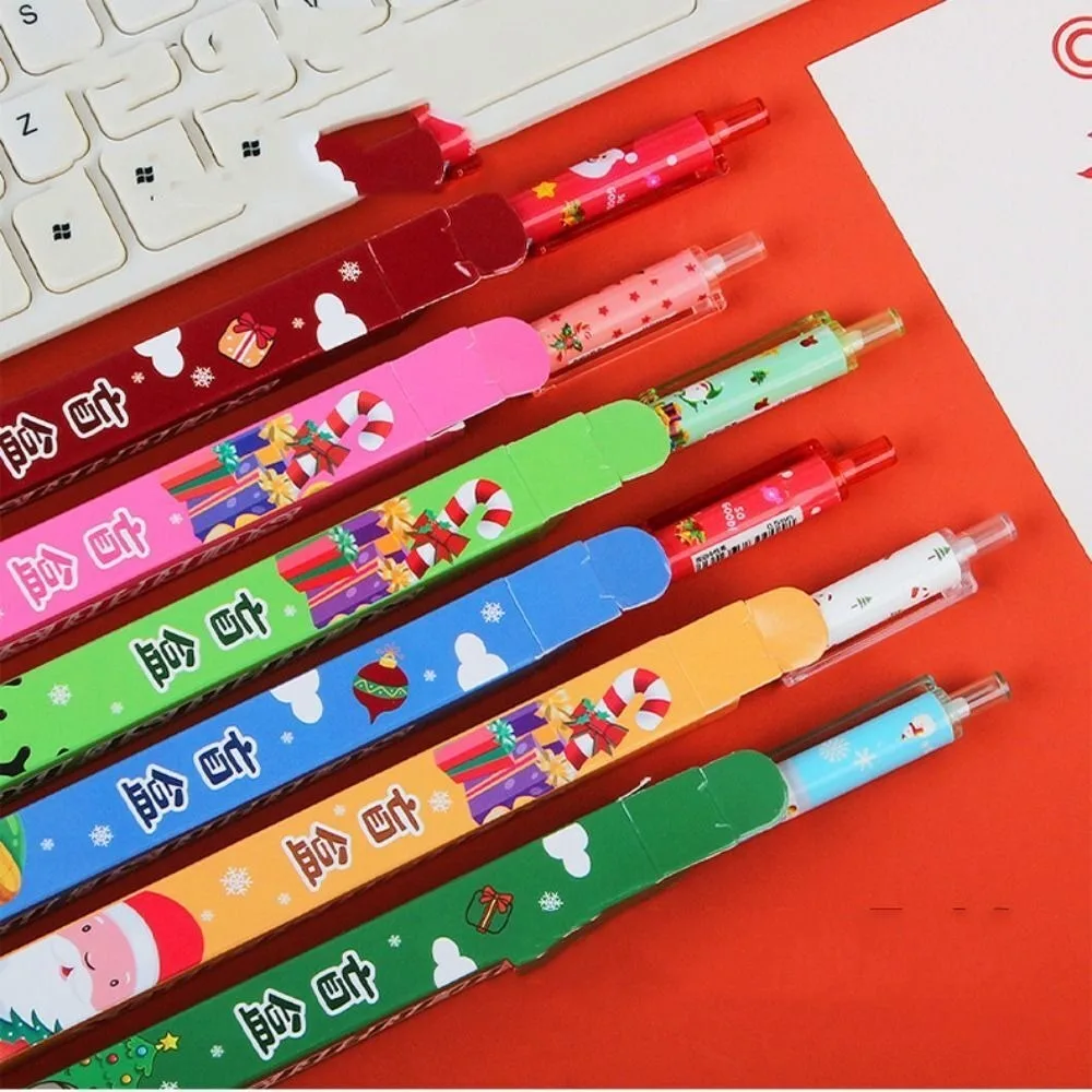 Creativo cartone animato Natale scatola cieca forniture per scrittura pressa ad asciugatura rapida inchiostro nero penna gel strumento di scrittura penna gel regali di Natale