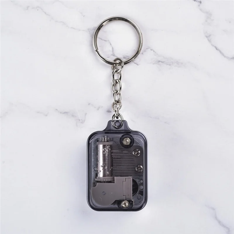 

New-Music Keychain Women Men Mini Music Box Movement Key Ring Musical Instrument Toy Car Bag Pendant Charms Jewelry