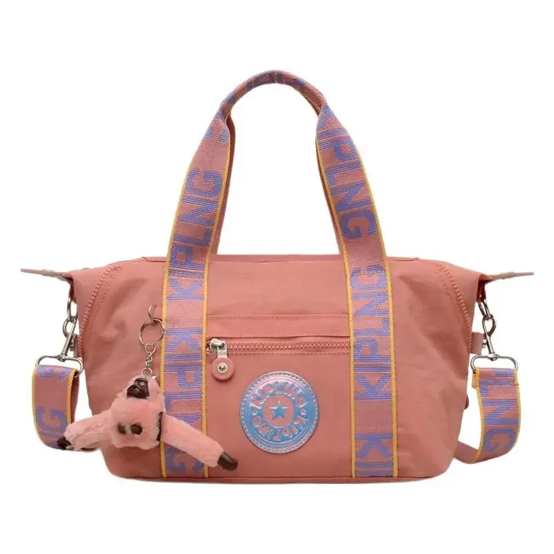 

2025 Water-Repellent Nylon Crossbody Bag - Women's Ultra Light Shoulder Purse with Monkey Charm, Fashion Sling Bag for Outing