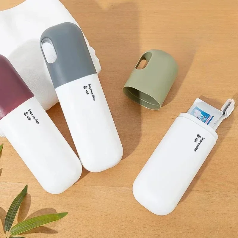 ชุดถ้วยเก็บแปรงสีฟันแบบพกพากล่องเก็บเก็บแปรงสีฟันดีไซน์สายลมแบบเรียบง่ายกล่องแปรงสีฟันเก็บในห้องน้ำ
