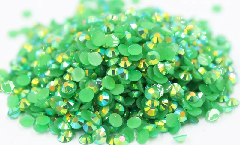 

Jelly Emerald AB Wholesale Flatback стразыResin Non hotfix Rhinestones in Bulk Package Plastic Nail Art Decoration for Garment