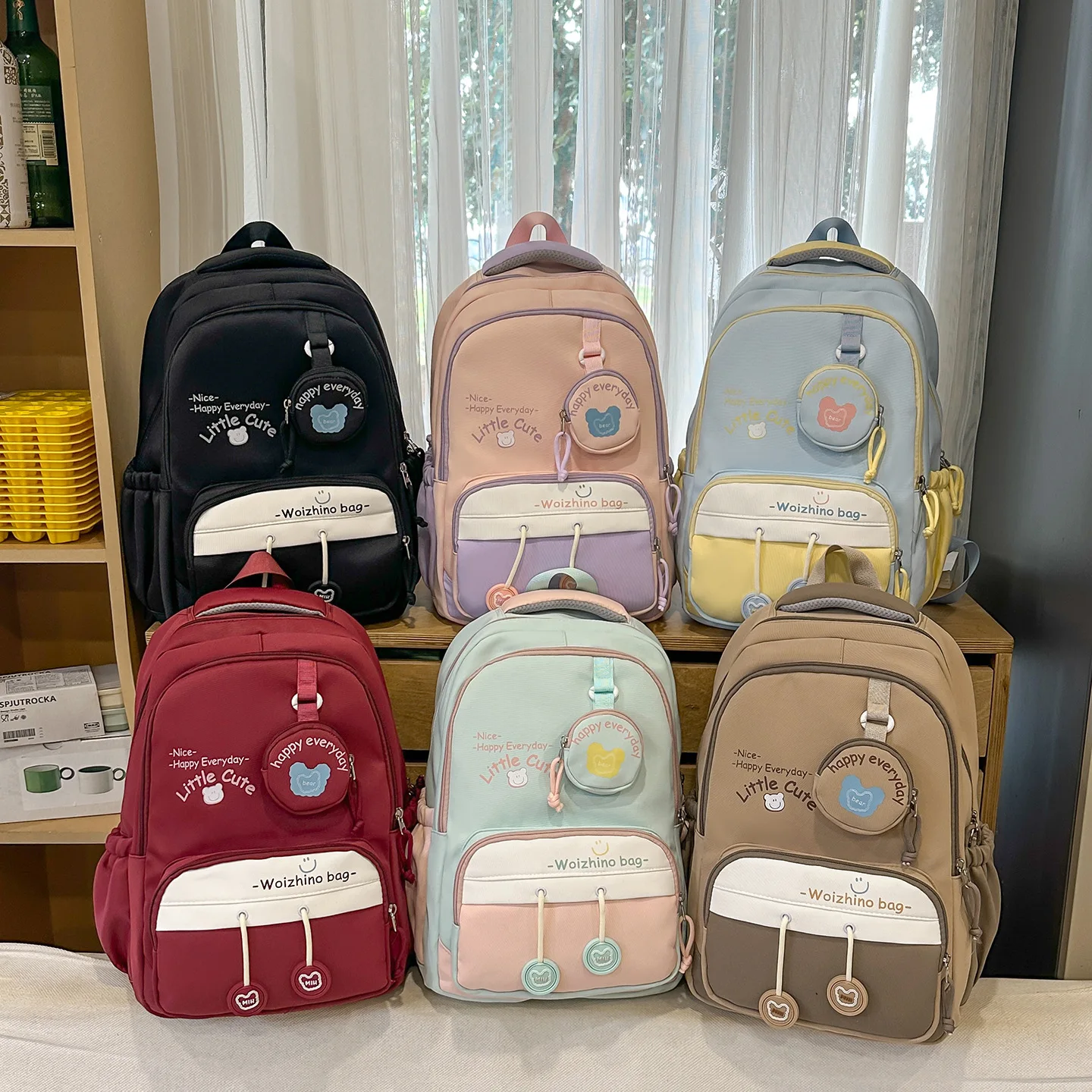 Lightweight nylon fabric student schoolbag, load-reducing large-capacity coin purse pendant, ladies' travel backpack