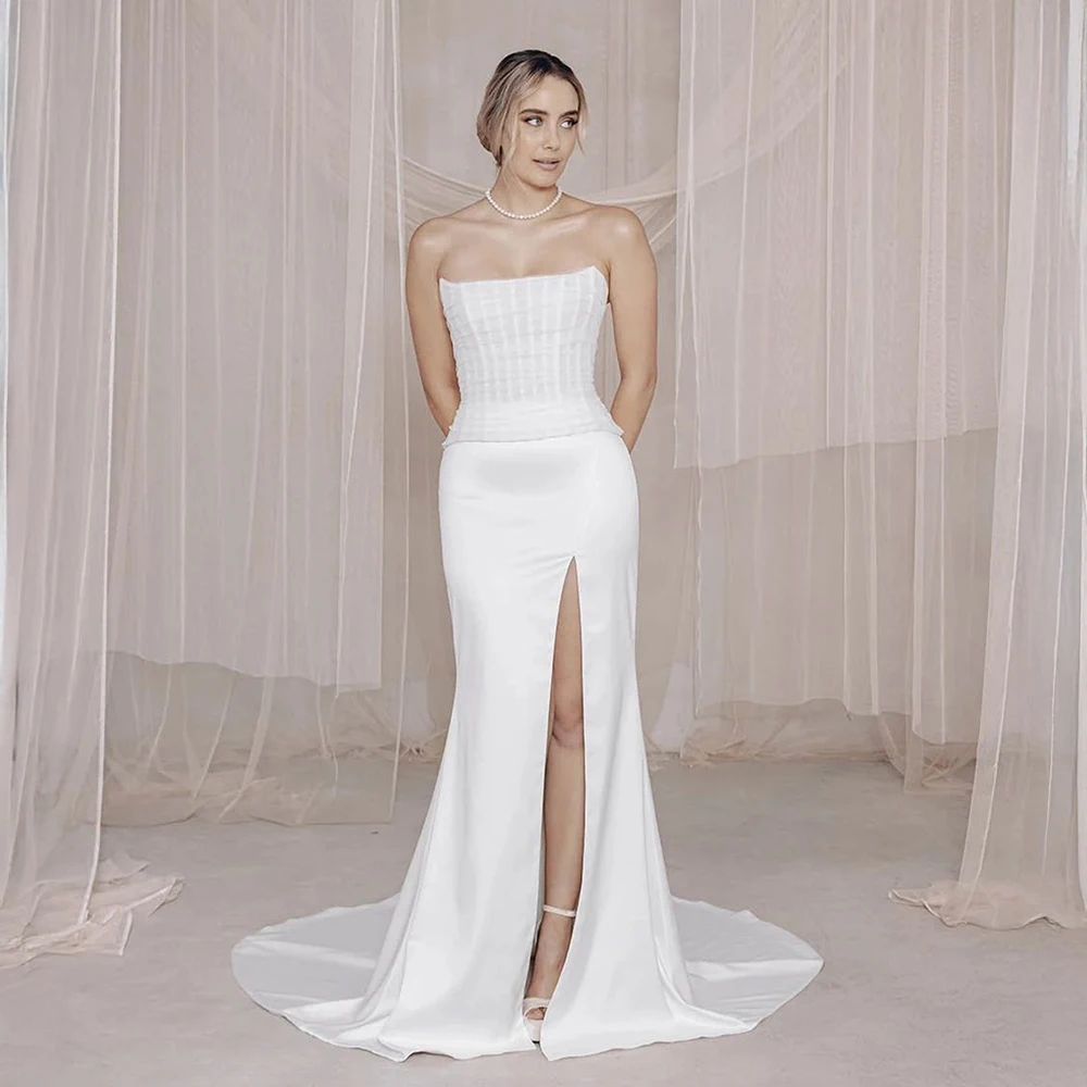 

Индивидуальное свадебное платье без бретелек в стиле «русалка» из атласа с высоким разрезом и шлейфом для современных невест